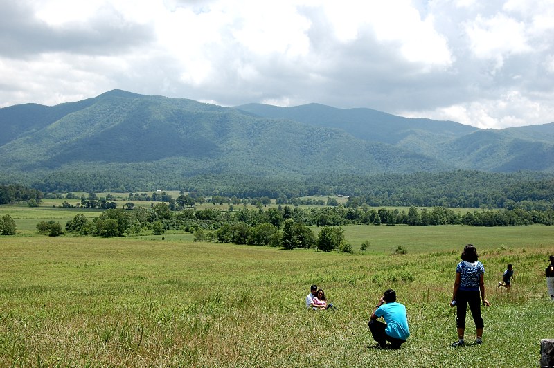 Tourists taking in the view from Cades Cove