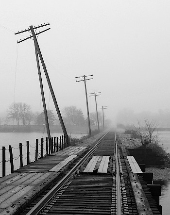 train tracks in fog
