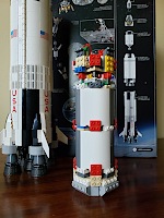 After 7 bags of Lego pieces, the second stage of a Saturn V rocket begins to form